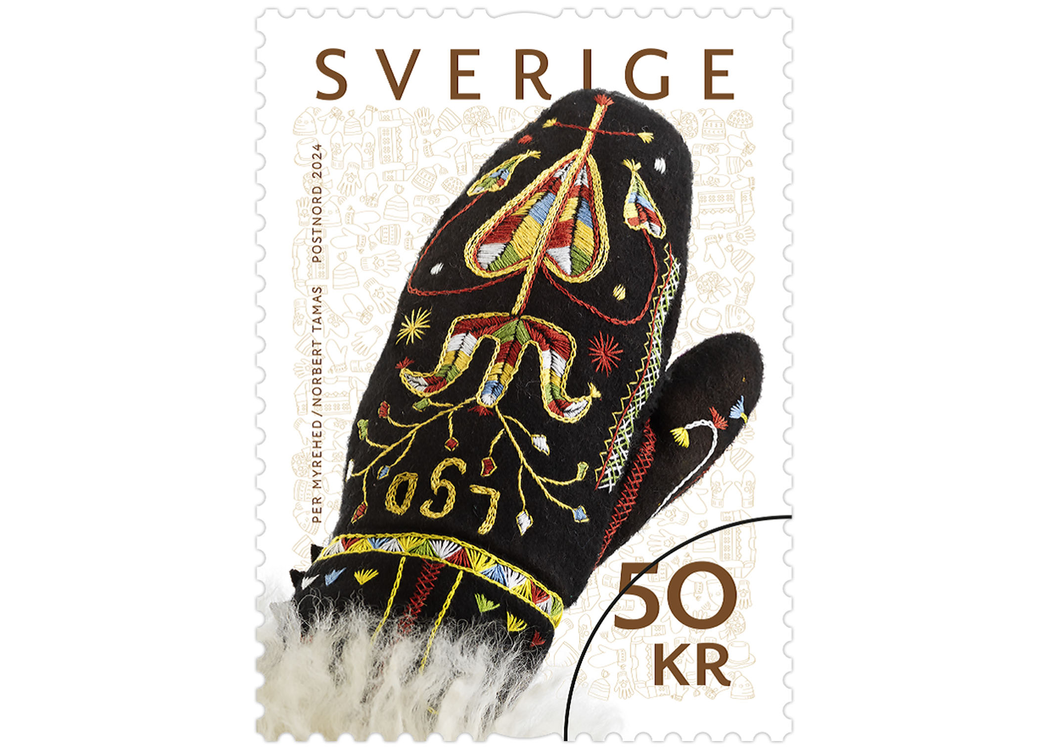 Rullfrimärke med motiv av en vackert broderad svart brudvante med färgglada mönster.